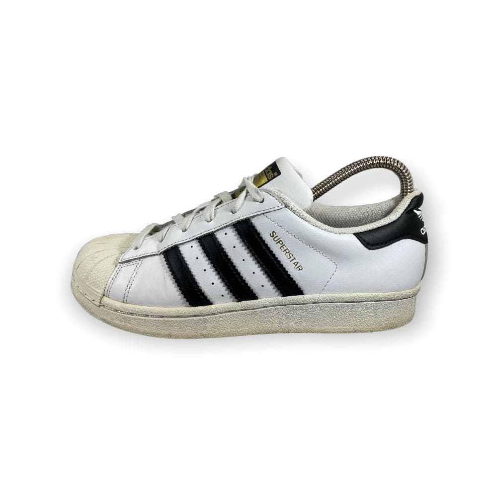 Adidas superstar cheap with black stripes